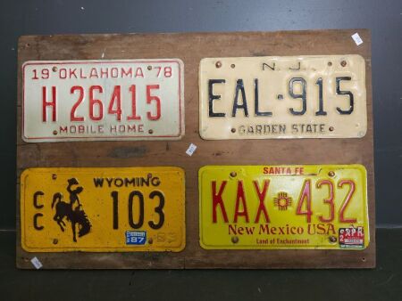 4 American Number Plates on Timber