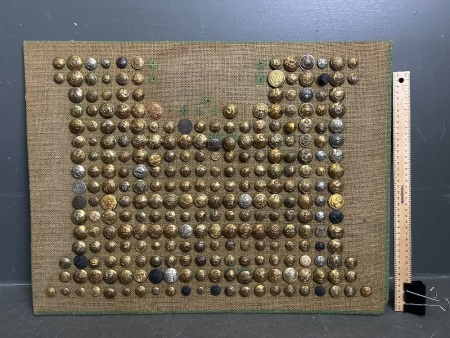 Range of Military Buttons Pinned to Hession Board