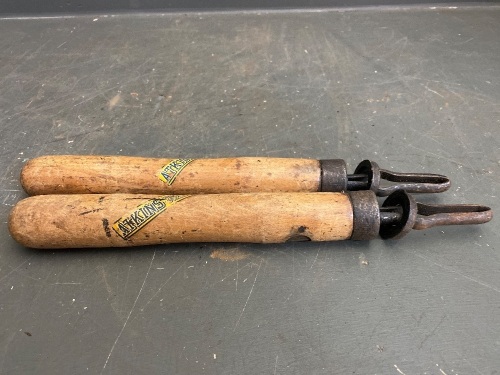 Atkins USA pair of cross cut saw handles with part decal
