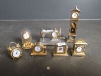 7 Miniature Brass Battery Clocks