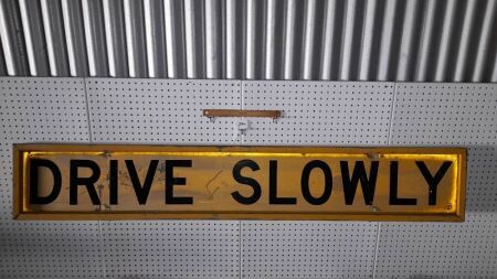 Vintage 'Telecom' Drive Slowly Sign