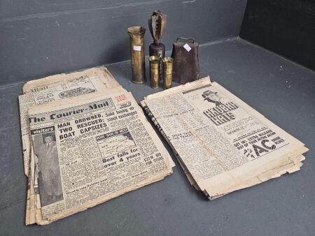 Brass Shell Casings, Genade Casing and Old Cow Bell ( no donger ) with Newspapers 1940 - 1960