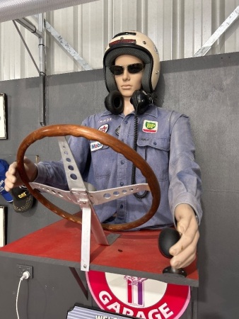 Mannequin Depicting Race Car Driver on Wall Mount