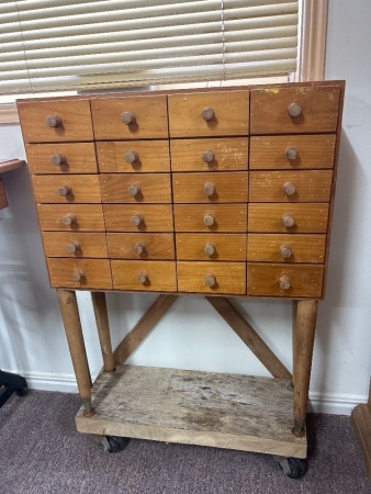 Mid Century Pine Chest of Organising Drawers (24) mounted on block with casters