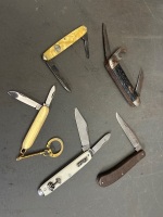 5 assorted pocket knives