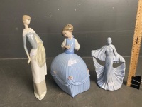 Three Ceramic Lady Figurines