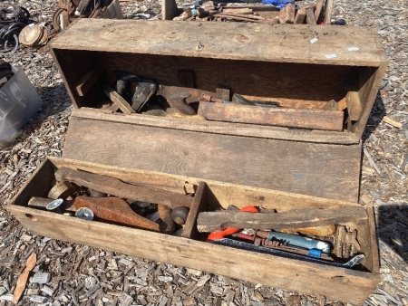 Wooden tool box of mixed tools