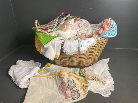 Large Cane Basket full of Vintage Tea Towels, Table Clothes and Lace