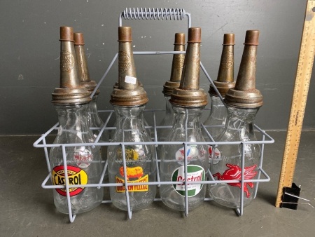 8 Oil Bottles in Wire Basket