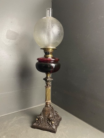 Tall Ruby Glass Kero Lamp with Cast Iron Base, Lion Head Motifs and Brass Stem/Fittings