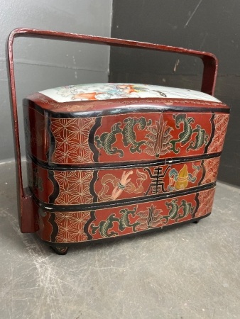 Chinese laquerware lunchbox with family rose ceramic panel