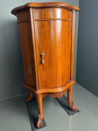 Bow front drinks cabinet polished wood carved feet