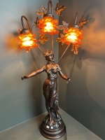 Figural lady lamp with amber hand blown shades large item