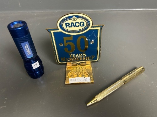 RACQ 50 years membership shield on stand, with pen and torch