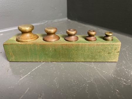 Brass weights set in holder
