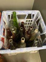 2 crates of collectors bottles coloured glass including NT stubby x 2 and amber demijohns plus others - 2