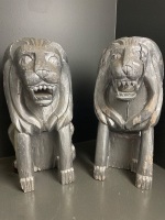 A pair of wooden painted lions 500mm tall