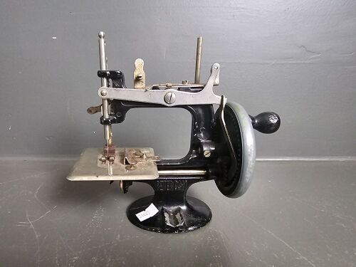 Antique Peter Pan Miniature Sewing Machine