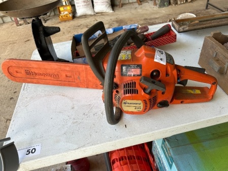 Husqvarna 235 chainsaw with sharpening jig and spare bar