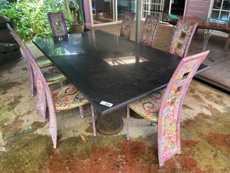 Stone top dining table on steel pillars and 6 funky chairs