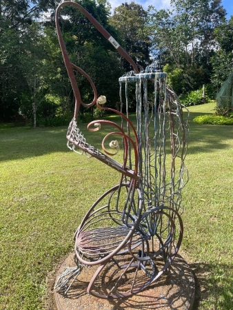 Iron garden sculpture seat