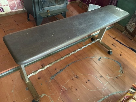 Slab top bench on steel legs and casters