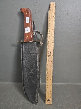 Large timber handle bowie knife with sheath, 255mm edge 385mm long