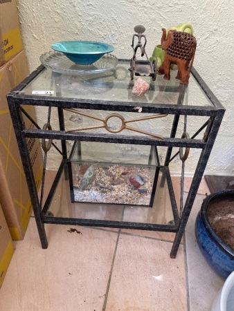 Steel and glass side table with ornaments 