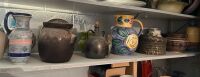 Shelf lot of jugs and pottery