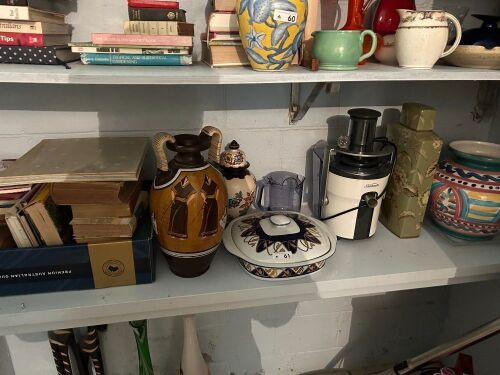 Shelf lot of books and pottery