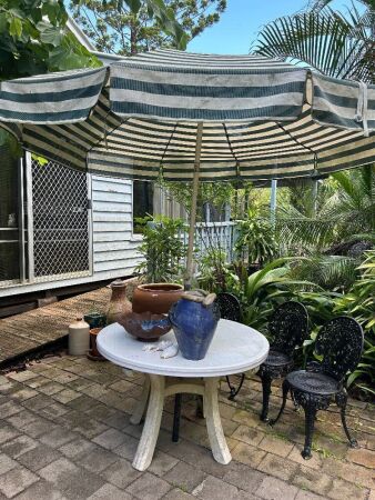 Outdoor table and umbrella