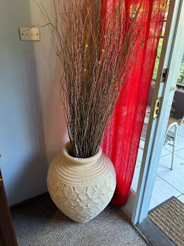 Large pot with dried reeds