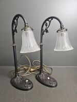 Pair of bronze look Art Deco style lamps with spare shade