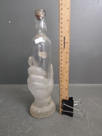 Vintage Depose Hand Holding the Bottle Clear Glass