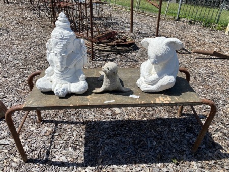 3 Garden Ornaments on Metal Table