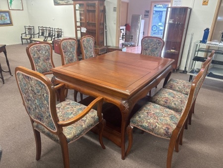 Rosewood dining table and leaves with 8 matching Embroided Dining Chairs