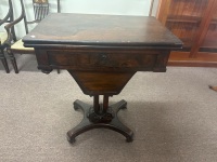 Antique Rosewood fold out sewing table on wheels