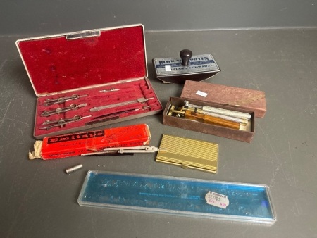 Box of vintage collectables inc. ink blotter, compass set, drafting pieces