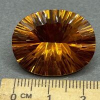 30 carat CITRINE Gemstone. Note Laser treated to enhance vibrant color