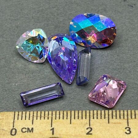 33 carats MYSTIC TOPAZ Gemstones. Note diffusion treated to enhance vibrant colors