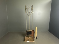 Brass look fire tools on stand