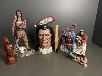 4 ceramic American Indian statues and 1 wooden statue