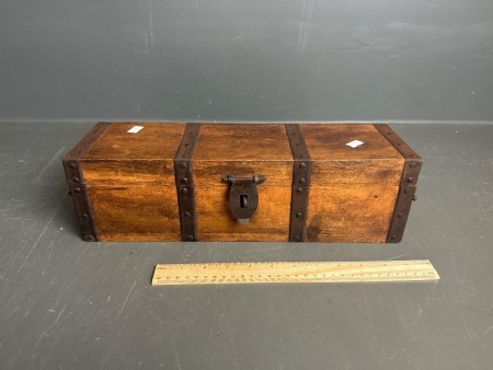 Vintage wooden trinket box with metal trim and hand-forged metal handles