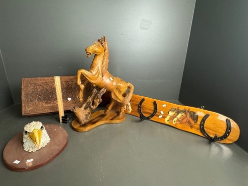 Carved wooden statue of rearing stallion, horseshoe hatrack on panted timber backing and carved wood Bald Eagle wall hanger and carved wooden trinket case