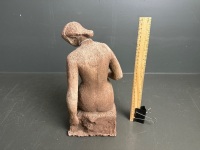 Clay sculpture of woman posing - 2