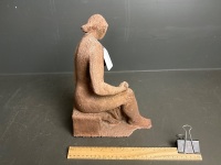 Clay sculpture of woman posing - 3