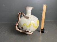 Elegant delicately coloured glazed ceramic vase/jug with clawed handle - signed to base