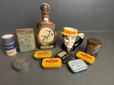 Job lot of vintage tins, whiskey decanter, XXXX mug etc.