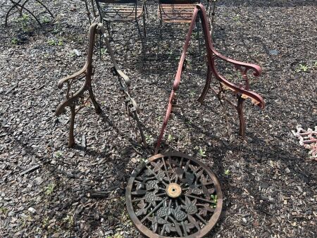 Cast iron lot inc. 2 bench ends and round decorative base/panel
