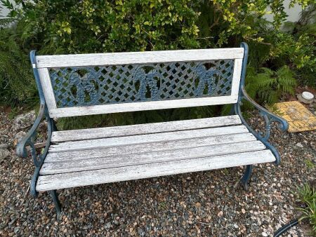 Bench seat with decorative cast iron ends and back insert